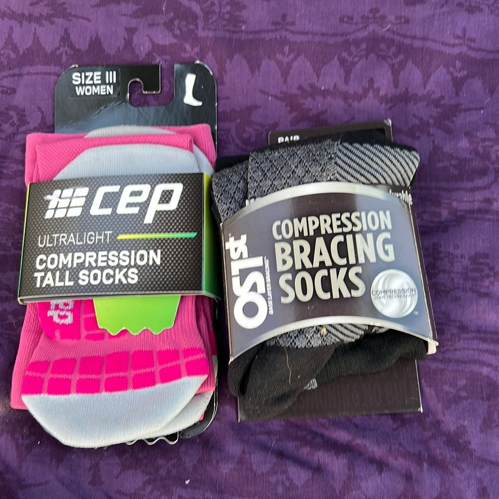 2 pair compression socks. Each pack is 30